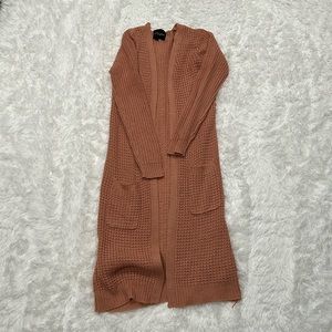 Pink cardigan sweater